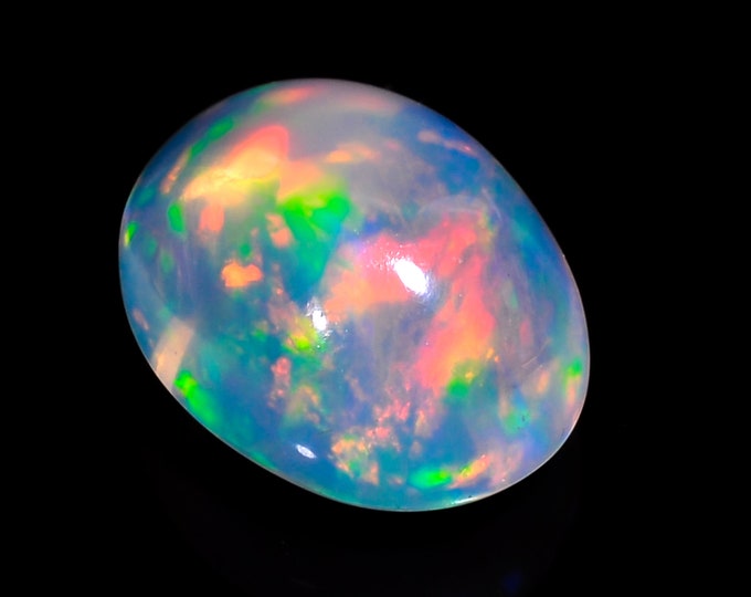 opal raw crystalNatural White Ethiopian Opal Oval Shape Cabochon Gemstone 13X10X8 MM 05.50 Cts.