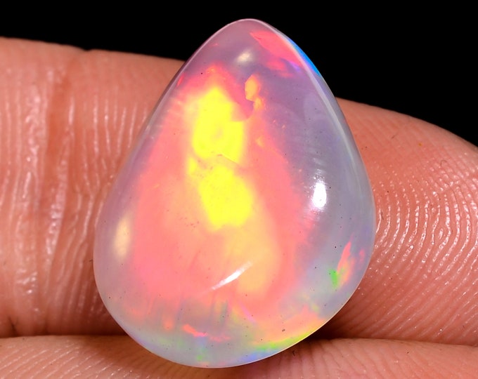 opal raw crystalOpal Cabochon: Stunning Loose Gemstone for Jewelry Making, 7.00 Crt,Natural white Rainbow fire Ethiopian opal cabochon.