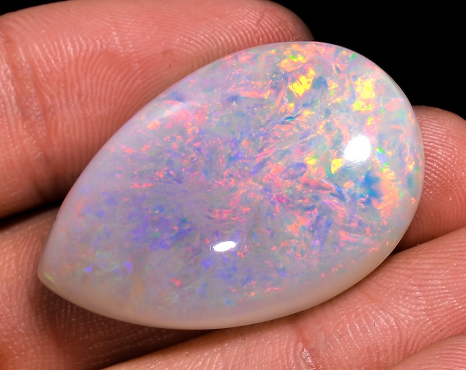 opal raw crystalOpal Cabochon: Stunning Loose Gemstone for Jewelry Making, 35.00 Crt,Natural white Rainbow fire Ethiopian opal cabochon.