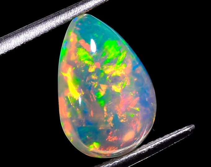 opal raw crystalOpal Cabochon: Stunning Loose Gemstone for Jewelry Making, 3.50Crt,Natural white Rainbow fire Ethiopian opal cabochon.