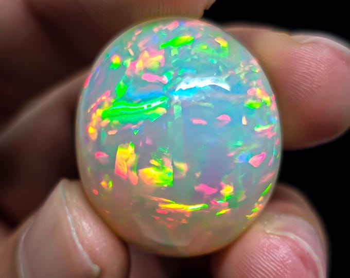 Gorgeous Top Grade Quality 100% Natural White Ethiopian Opal Oval Shape Cabochon Gemstone For Making Jewelry 26X22X12 MM 35.00 Cts.