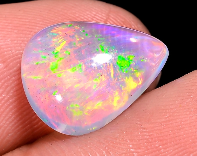 opal raw crystalOpal Cabochon: Stunning Loose Gemstone for Jewelry Making, 03.50 Crt,Natural white Rainbow fire Ethiopian opal cabochon.