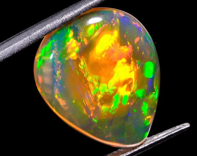 opal raw crystalOpal Cabochon: Stunning Loose Gemstone for Jewelry Making, 8.50 Crt,Natural white Rainbow fire Ethiopian opal cabochon.