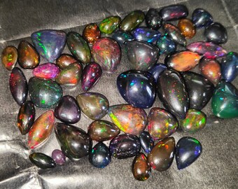 Ethiopian Black Opal Cabochons: 238 Carat AAA Gemstones