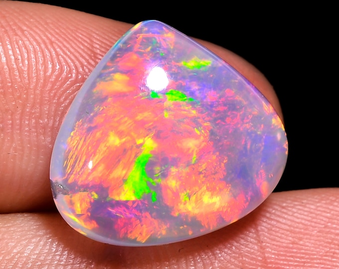opal raw crystalOpal Cabochon: Stunning Loose Gemstone for Jewelry Making, 9.00 Crt,Natural white Rainbow fire Ethiopian opal cabochon.