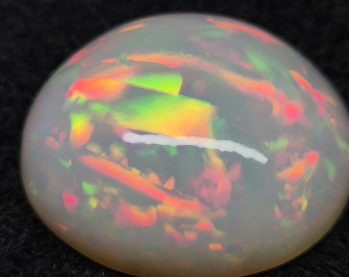 Natural Ethiopian Fire Opal – Rare 37.50 Ct Oval Cabochon