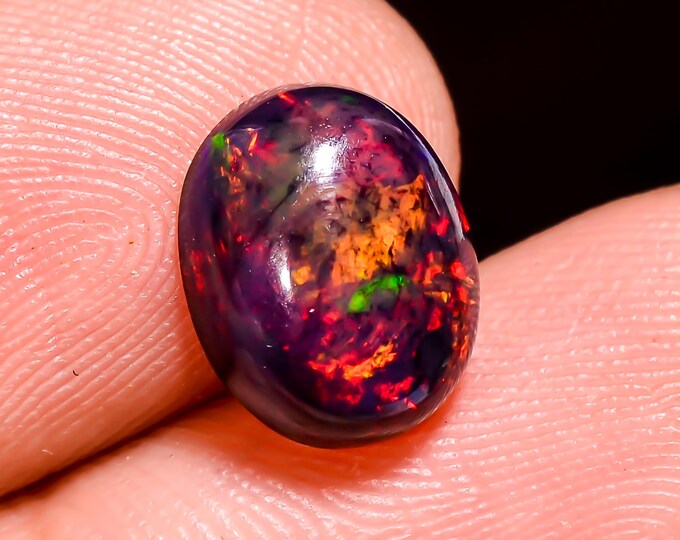 Natural Fire Black Ethiopian Opal Oval Gemstone 10x8x4 MM 1.5 Ct