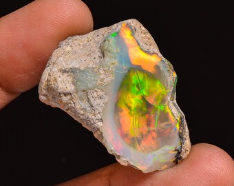 Ethiopian Opal Rough Gemstone: Natural Fire Opal for Jewelry Making (29X25X13 MM, 35.50 Cts.)
