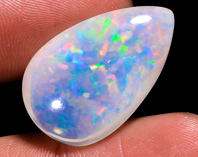 opal raw crystalOpal Cabochon: Stunning Loose Gemstone for Jewelry Making, 15.00 Crt,Natural white Rainbow fire Ethiopian opal cabochon.