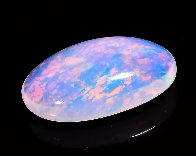 opal raw crystalOpal Cabochon: Stunning Loose Gemstone for Jewelry Making, 26.50 Crt,Natural white Rainbow fire Ethiopian opal cabochon.