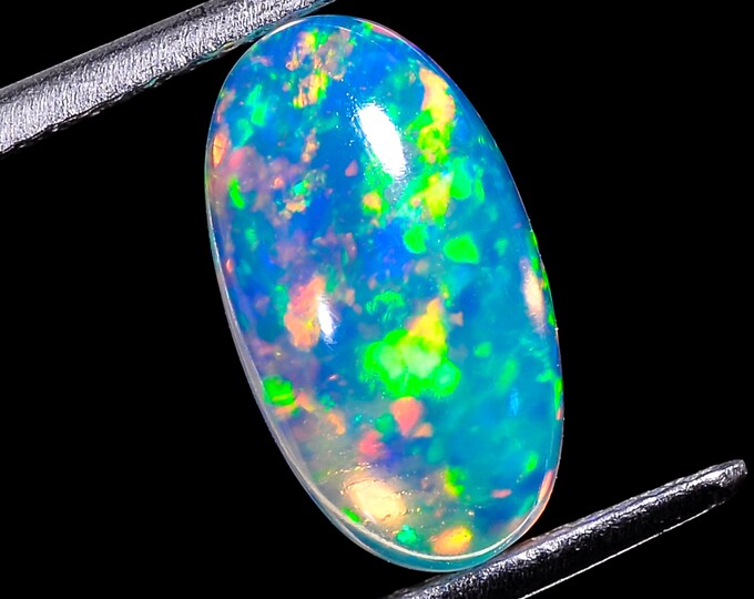 opal raw crystalOpal Cabochon: Stunning Loose Gemstone for Jewelry Making, 2.50Crt,Natural white Rainbow fire Ethiopian opal cabochon.