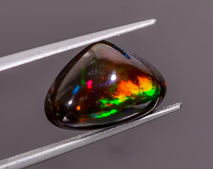 04.45 Cts. Natural Black Opal Cabochon, Iridescent Gemstone for Crafting, Perfect Gift for October Birthdays. 10x14x07mm