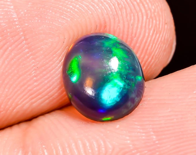 Natural Fire Black Ethiopian Opal Oval Gemstone 8x7x3 MM 1.00 Ct
