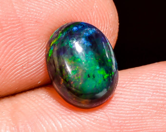 Natural Fire Black Ethiopian Opal Oval Gemstone 10x7x04 MM 1.5 Ct