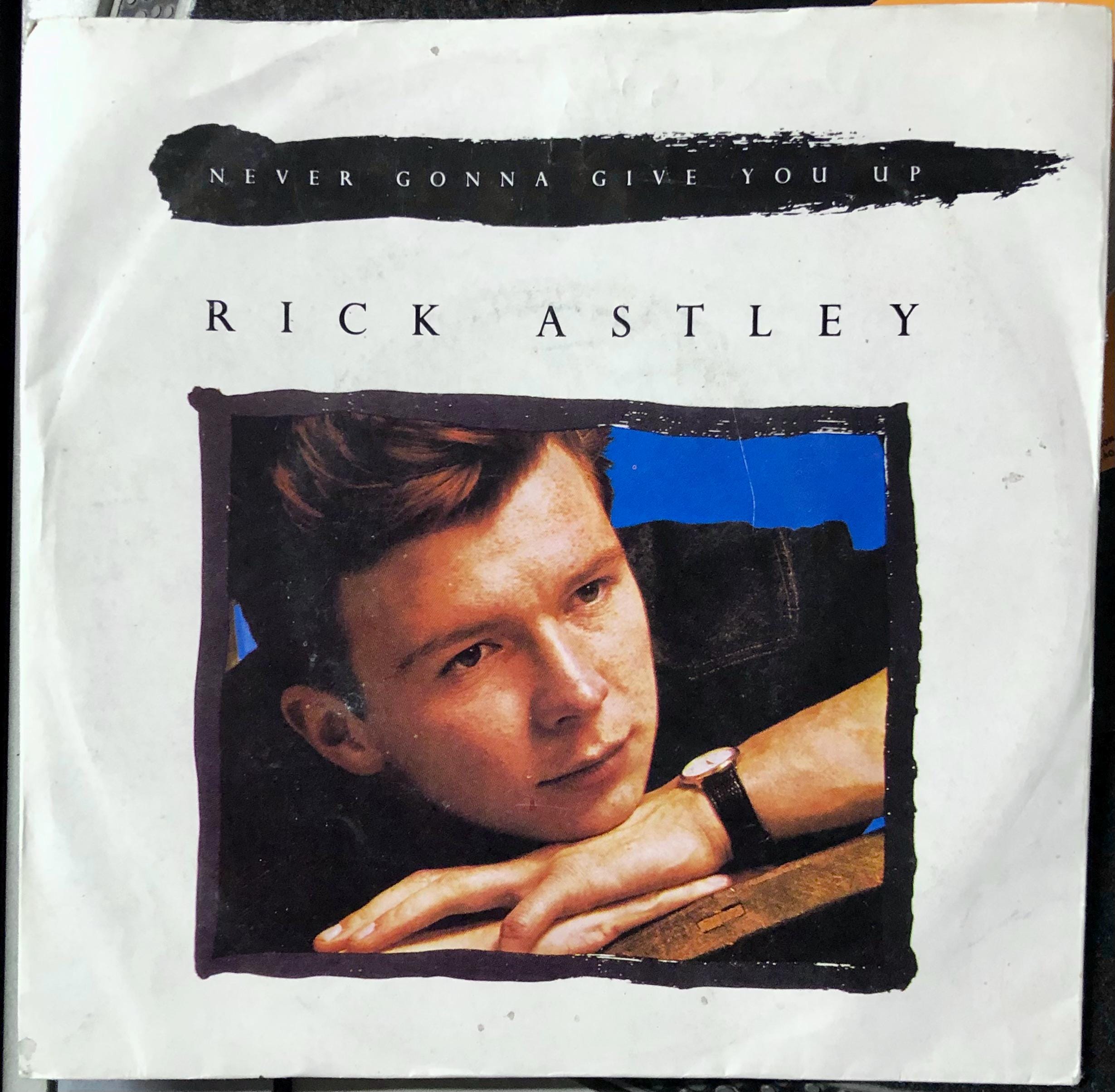 Rick Astley Never Gonna Give You Up レコード Rick Astley Never Gonna Give You up Signed Blue Colored 7