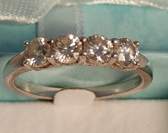 Beautiful 4 Moissanite ring