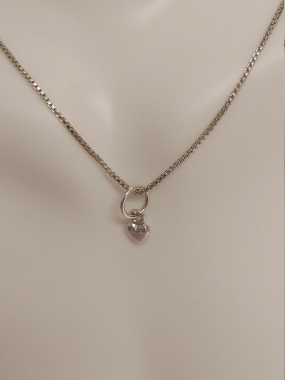Sterling silver tiny heart pendant