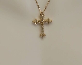 14 kt Yellow gold and .20ct diamond cross necklace 18"