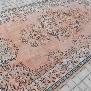 Vintage Turkish Area Rug 6x9ft, Elegant Peach Tones with Intricate Floral Patterns, Handwoven Bohemian Decor, Unique Living Room Accent