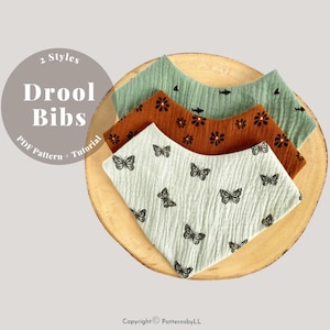May include: Three different styles of baby bibs, each with a different pattern. The bibs are made of a soft, absorbent fabric and are perfect for keeping baby's clothes clean. The bibs are displayed on a wooden surface. The text on the image reads "2 Styles Drool Bibs PDF Pattern + Tutorial".