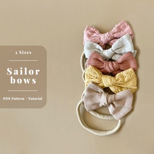 May include: Five fabric hair bows in different colors and patterns, including pink, beige, yellow, and white. The bows are tied with a knot in the center and are attached to elastic headbands. The text "3 Sizes Sailor bows PDF Pattern + Tutorial" is visible in the image.