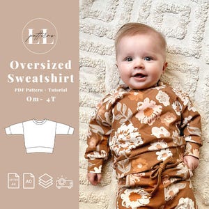 May include: A baby wearing a brown floral print sweatshirt and pants set. The image includes a graphic of a sweatshirt and text that reads "Oversized Sweatshirt PDF Pattern + Tutorial 0m-4T". The baby is smiling.