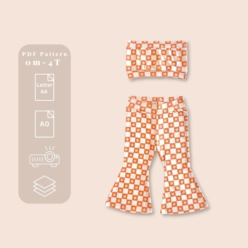 May include: PDF pattern for a checkered orange and white top and pants set for children sizes 0-4T. The pattern is available in letter and A0 sizes.