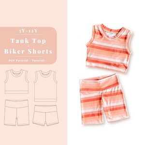 May include: A digital sewing pattern for a tank top and biker shorts for children sizes 5-12 years. The pattern includes a PDF pattern and tutorial. The image shows a white outline of the pattern pieces on a pink background, and a photo of a pink and white striped tank top and biker shorts.