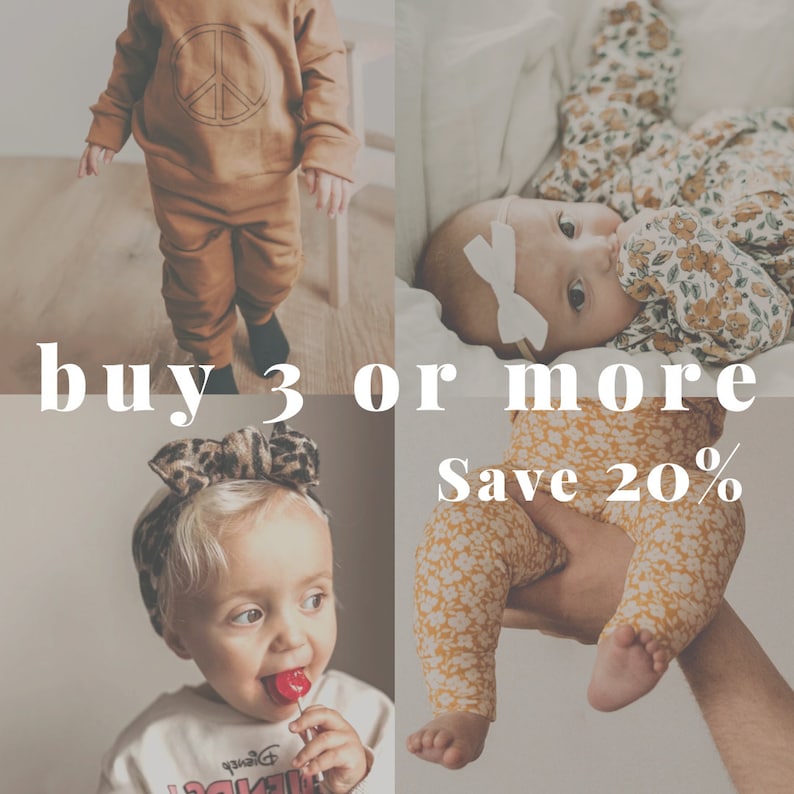 May include: A collage of three images featuring children's clothing. The first image shows a brown outfit with a peace sign on the front. The second image shows a baby wearing a floral print outfit. The third image shows a child wearing a white shirt with a lollipop. The text "buy 3 or more Save 20%" is displayed on the image.