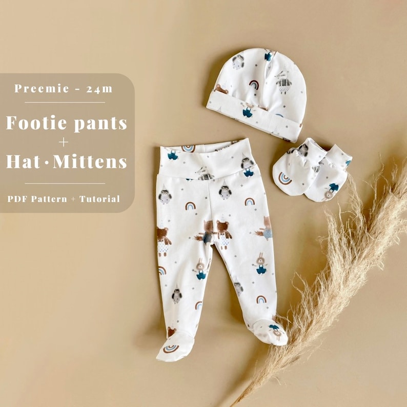 May include: A white baby footie pants set with a bear and rainbow print. The set includes a hat and mittens. The text "Preemie - 24m Footie pants + Hat. Mittens PDF Pattern + Tutorial" is visible in the image.