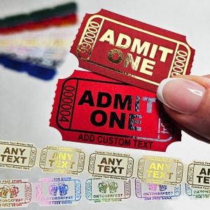 Puede incluir: Entradas rojas y doradas con las palabras "ADMIT ONE" impresas en negro. También se ven entradas adicionales con el texto "ANY TEXT" y "OKTOBERFEST ONE FREE DRINK".