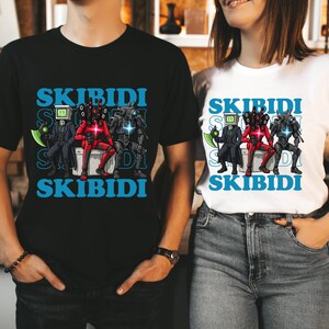 Maglietta SKIBIDI per bambini e adulti - Divertente maglietta con meme e robot - Maglietta con cartoni animati di tendenza - Fantastico outfit coordinato in stile Skibidi