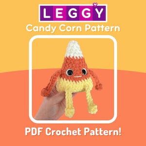May include: A crochet pattern for a candy corn character with a white, orange, and yellow body. The pattern is called "Candy Corn Pattern" and is available as a PDF download. The pattern is by Leggy.