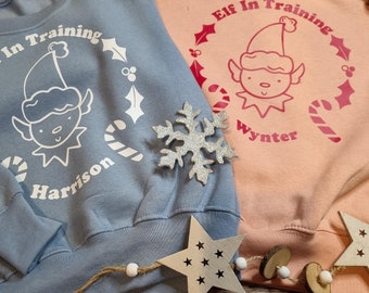 Personalised Christmas Elf in Training  children’s Sweatshirt  Lapland uk lapland Xmas gift - childrenwear Santa xsmas stars magic believe