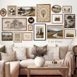 May include: A collection of framed art prints in various sizes and styles, including landscapes, floral arrangements, and animal portraits, displayed on a white wall. The prints are in gold and black frames. The text "7 Art Prints" is visible.