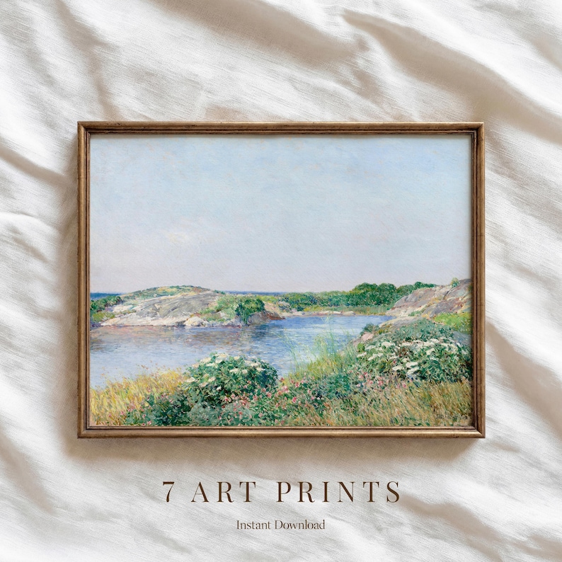 May include: A framed landscape art print featuring a serene coastal scene with a body of water, rocky terrain, and lush greenery. The artwork is in a wooden frame and has the text "7 ART PRINTS" and "Instant Download".