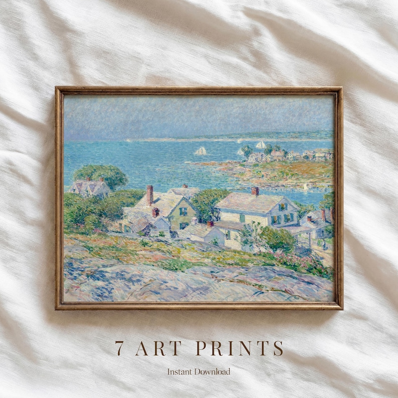 May include: A framed art print of a coastal landscape with houses, trees, and a body of water. The artwork features a muted color palette with shades of blue, green, and brown. The text "7 ART PRINTS" and "Instant Download" are at the bottom.