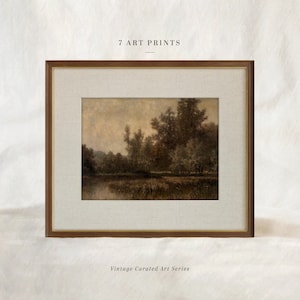 May include: Framed art print featuring a landscape scene with trees and water. The artwork is in a wooden frame with a linen mat. The text "7 ART PRINTS" is at the top, and "Vintage Curated Art Series" is at the bottom.