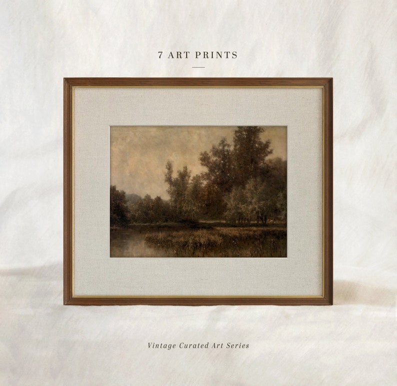 May include: Framed art print featuring a landscape scene with trees and water. The artwork is in a wooden frame with a linen mat. The text "7 ART PRINTS" is at the top, and "Vintage Curated Art Series" is at the bottom.