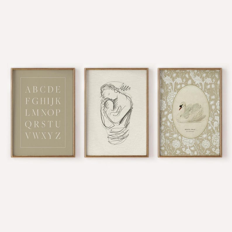 May include: Three framed prints with a minimalist aesthetic. The left print features the alphabet in a simple font on a light green background. The center print is a black and white line drawing of a mother holding a baby. The right print features a white swan on a floral background with the text "White Swan" in a serif font.