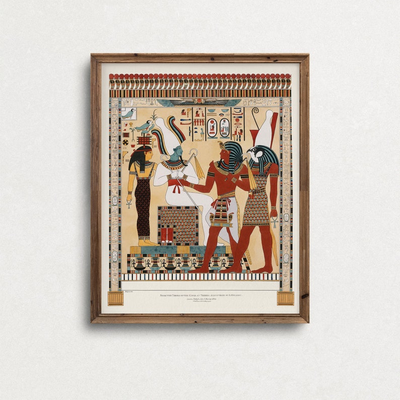 May include: A framed print of an ancient Egyptian wall painting depicting three figures. The figures are standing in front of a hieroglyphic background. The central figure is wearing a white robe and holding a staff. The figure on the left is wearing a blue dress and the figure on the right is wearing a red and gold robe. The print is titled "House of the Tomb of the King of Thebes, discovered in 1825."