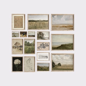 May include: A gallery wall of framed prints featuring various landscapes, still life, and abstract art. The prints are in a variety of sizes and styles, and are arranged in a symmetrical pattern on a white wall.