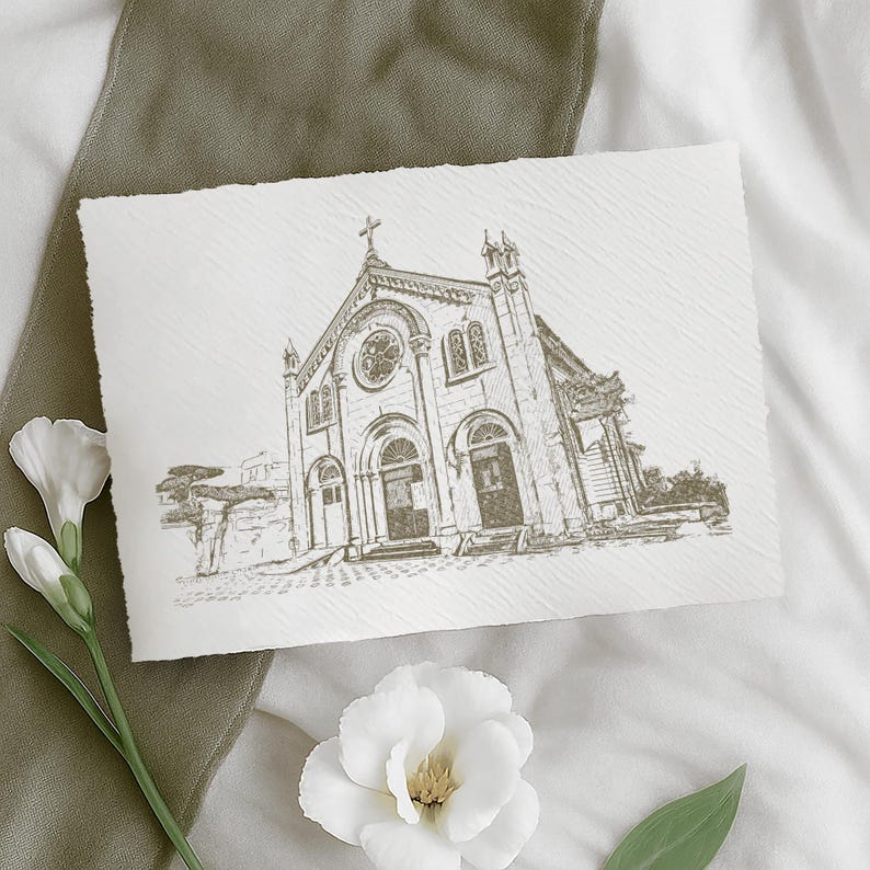 May include: A sepia-toned sketch of a church with a cross on top, set against a textured paper background. The church features arched doorways, a rose window, and detailed architectural elements. White flowers and a green fabric accent the scene.