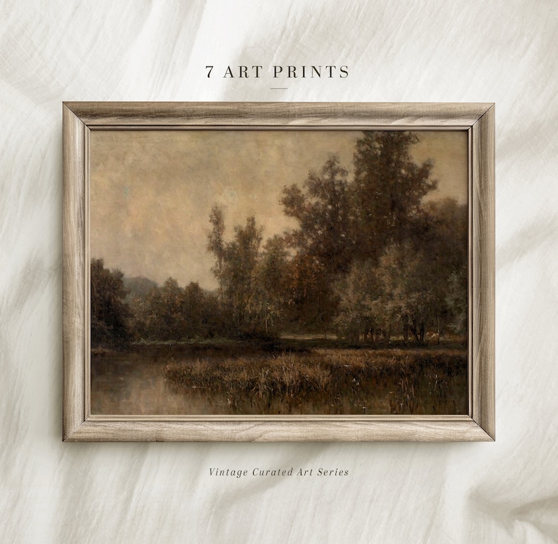 May include: A framed landscape art print featuring a serene scene of trees and a body of water. The artwork has a vintage aesthetic with a muted color palette of browns and greens. The text "7 ART PRINTS" and "Vintage Curated Art Series" are visible.
