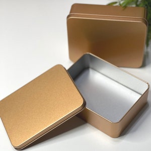 empty metallic copper tin with lid