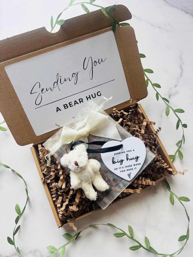 BEST SELLER. Send a hug. Post a hug. Thinking of you. Pocket hug. Get well soon gift. Grievance gift. Personalised gift. Big bear hug Fluffy Bear & Heart