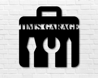 May include: Black metal toolbox silhouette with the text "TIM'S GARAGE" and three tools inside: a wrench, a screwdriver, and a hammer.