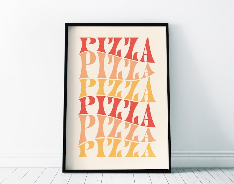 May include: A framed art print with the word "PIZZA" repeated in a stacked, wavy pattern. The word is in a retro font, with colors ranging from red to orange to yellow. The print is in a black frame.