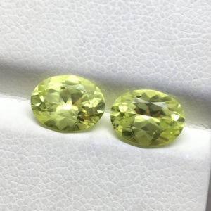 Sparkling (unheated) natural chrysoberyl best oval cut gemstone matching pair good quality yellowish green color 2.95 carat 8x6 mm
