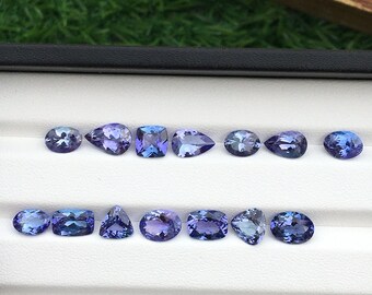 Beautiful zoisite tanzanite faceted loop clean gemstone 14 pieces 14.15 carat length 9-6 mm